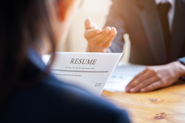 Candidate at job interview with CV
