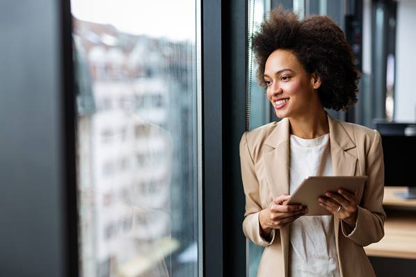Business person holding tablet