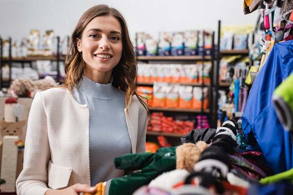 Customer shopping in clothes store
