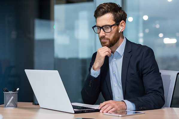 Business executive at work on his computer