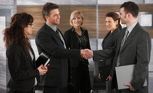 Smiling business people