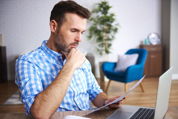 Small business owner working on his accounts
