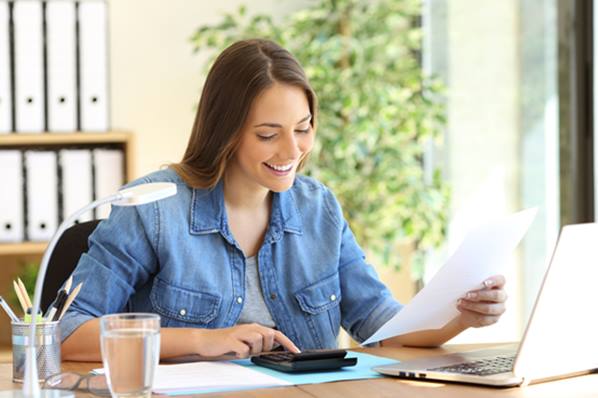 Small business owner using customer invoicing software