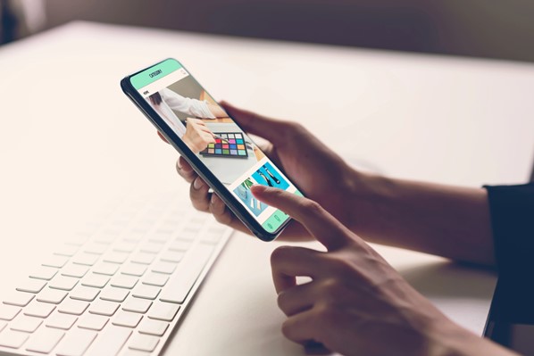 Person holding mobile phone