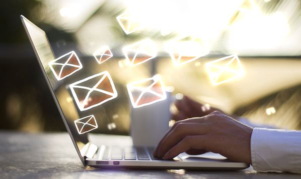 Man sending an email