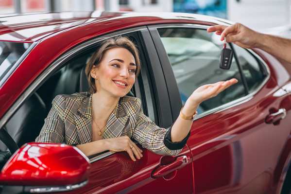 Customer being given car key after auto service