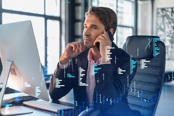 Forex Trader on the phone with client