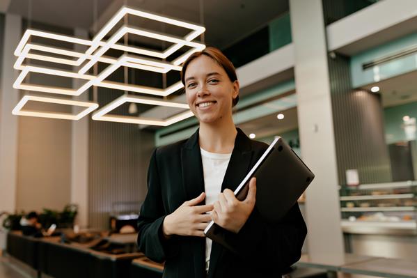 Happy hotel manager