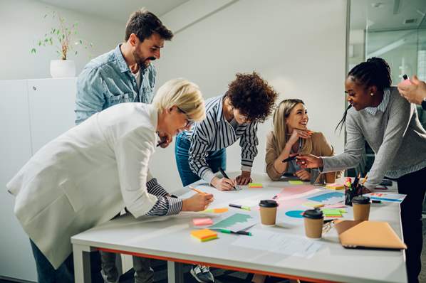 Diverse employees working together