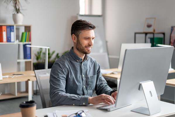 Drupal developer working on computer