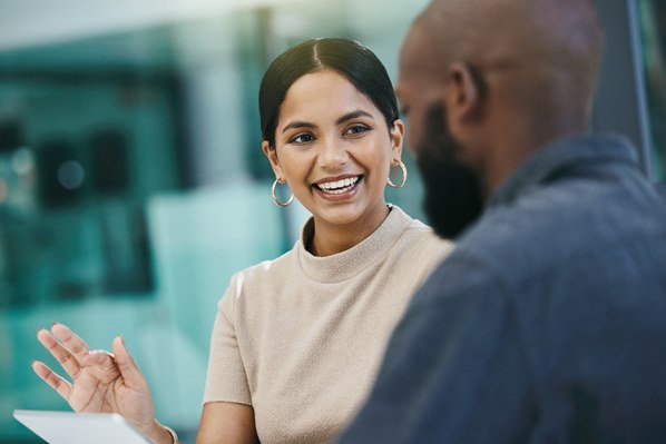Sales assistant talking to a customer