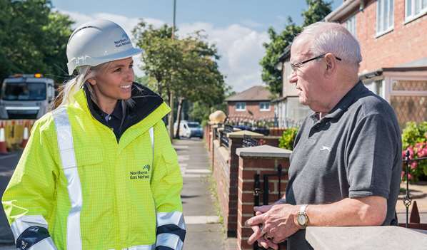 Customer talking to Northern Gas representative
