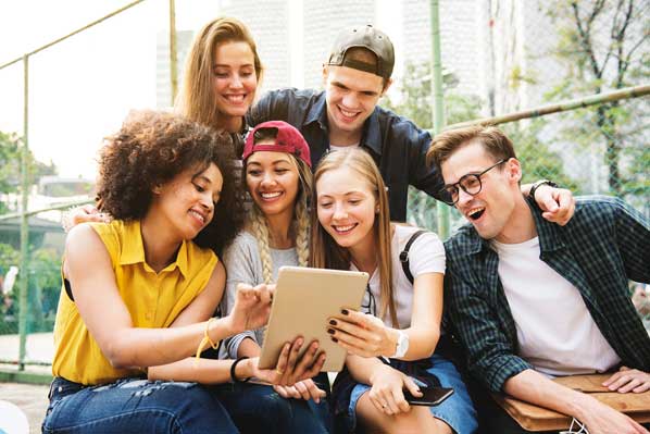 Group of millennials have fun