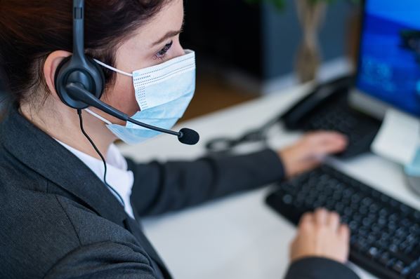 CSR wearing mask at work
