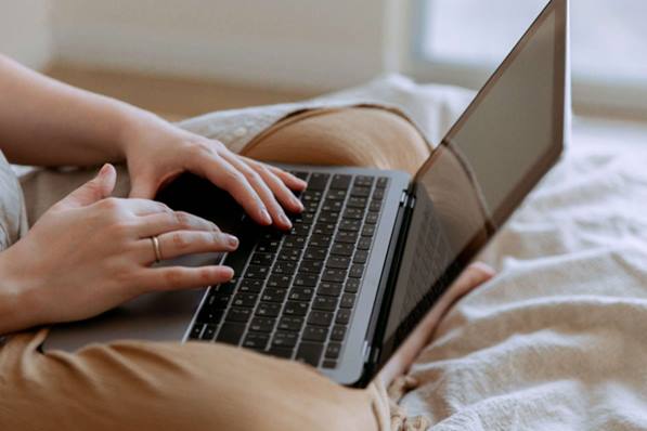 Customer contacting helpdesk on her laptop