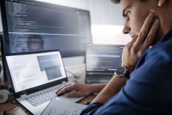 Software engineer writing code