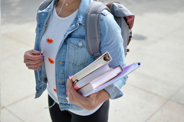 Student carrying books